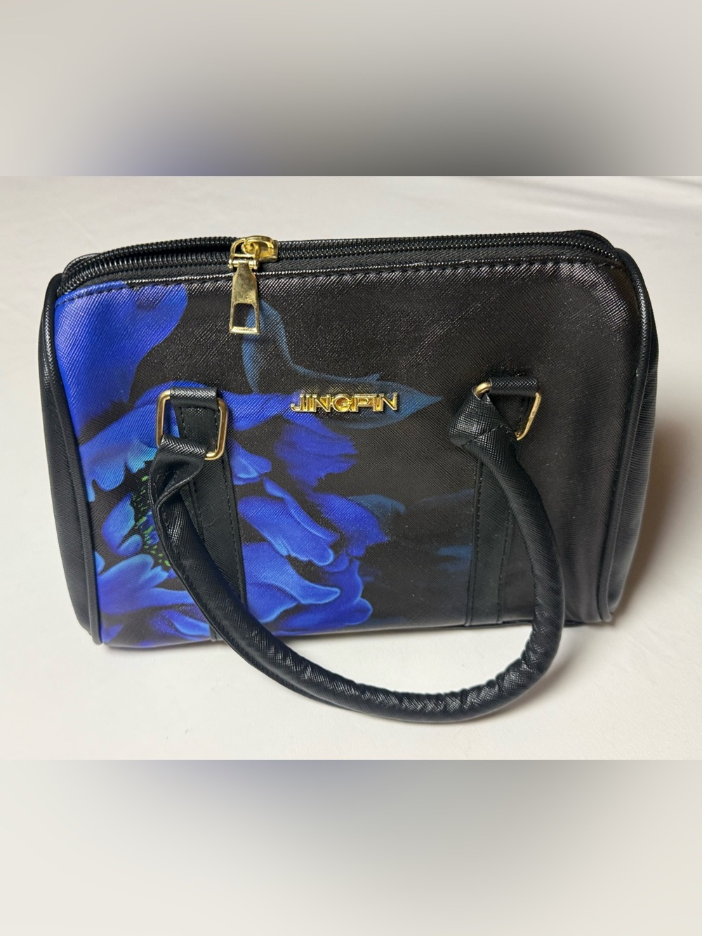 Black Handbag with Blue Floral Accent